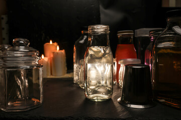 Alchemist laboratory mystery red ink flowing down bottle candle light smoke fog floating mistic...