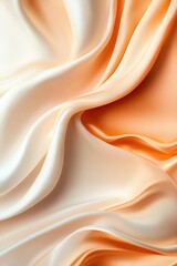 Obraz premium A play of creamy and orange fabric forms a mesmerizing wavy motion, presenting an elegant dance of colors and textures, captured artistically.