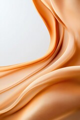 Obraz premium Gentle flow of peach-toned fabric forms soft and subtle waves with light effects, creating a harmonious blend of elegance and tranquility.