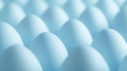 Smooth blue eggs arranged in pattern create calming and serene atmosphere. soft hues and uniform shapes evoke sense of tranquility and simplicity