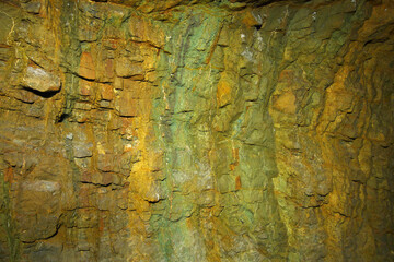 Mining tunnel with colorful streaks of rock