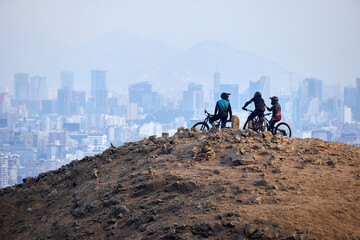 Carving down the epic trails of El Morro Solar. Whit the view of pacific Ocean and Lima on the background. Chorrillos, Lima, Peru