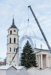 Vilnius Cathedral in Old Town with a Large Christmas Tree Under Construction, Crane in Action, Christmas Decorations, Lithuania, Lietuva, preparation