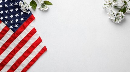 Obraz premium A photostock of the American flag waving gently against a clean white background, ideal for patriotic or national celebration designs. High Quality
