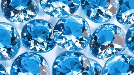 Fototapeta premium A close-up shot of many blue diamonds arranged on a white surface, ideal for jewelry or luxury-themed designs