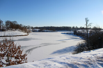 winter landscape overlooking a frozen lake