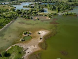 Aerial view with a delta, an ecosystem full of lakes and green willows. Amazing wild landscape seen...