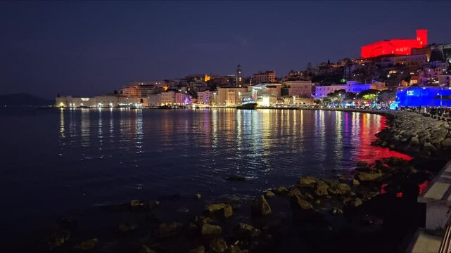 Night view of Gaeta city on the tyrrhenian sea in Lazio region, Italy