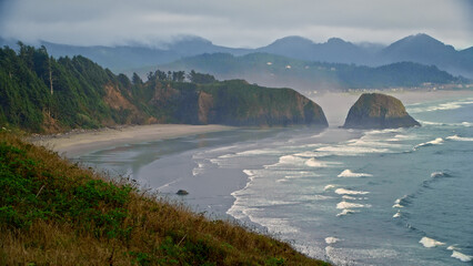 Beautiful, misty ocean waves on Oregon coast - high, wide shot of view