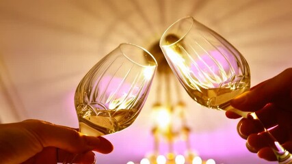 champagne glasses clinking in celebration against shimmering festive lights, capturing the joy and excitement of new year's eve, perfect for holiday-themed concepts

