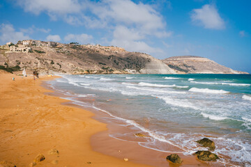 Aerial panoramic beach view of Ramla bay from Tal-Mixta Cave on a sunny day. Gozo island. Malta