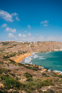 Aerial panoramic beach view of Ramla bay from Tal-Mixta Cave on a sunny day. Gozo island. Malta