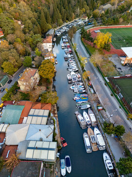 Aerial view of goksu creek with boats and buildings surrounded by greenery, anadolu hisari, istanbul, turkey.