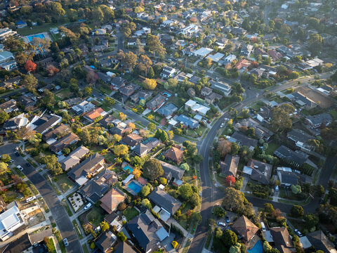 Aerial view of beautiful suburban homes and green trees in Templestowe Lower, Melbourne, Victoria, Australia. - Powered by Adobe