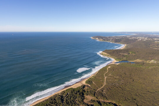 Aerial view of glenrock beach with serene waves and beautiful coastline, Merewether, Newcastle, Australia.