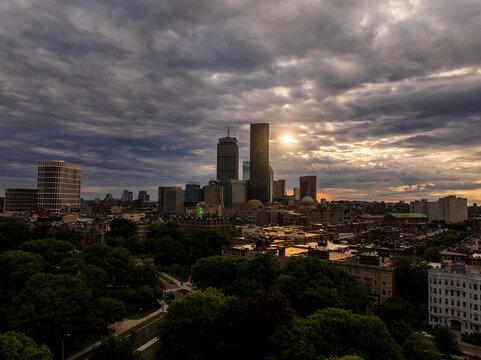 Aerial view of boston skyline featuring the prudential center and statehouse with greenery and park, fenway, united states.