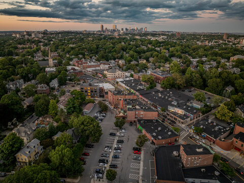 Aerial view of a beautiful urban cityscape featuring highrise buildings and lush greenery, Jamaica Plain, United States.