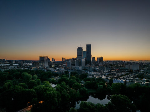 Aerial view of the beautiful boston skyline at sunrise with the prudential center and trees, Fenway, United States.