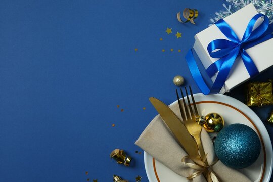 New Year table setting on color background 