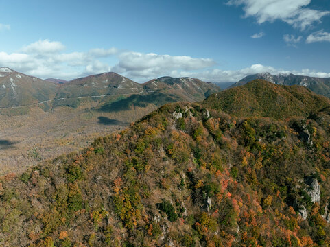 Aerial view of beautiful autumn landscape with Mount Picentini and scenic forest, Giffoni Valle Piana, Italy.