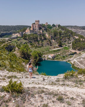 Aerial view of medieval castle overlooking the scenic river and beautiful landscape, Alarcon, Cuenca, Spain.