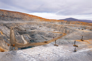 Industry Open coal mine, Drilling machine borer installing cast explosives blasting