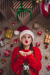 Above view vertical portrait of nice young woman send air kiss you wear sweater new year xmas time...