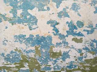 Background of an old plastered wall with peeling paint