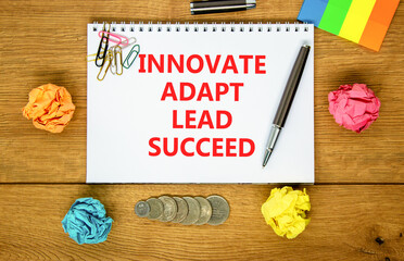 Innovate adapt lead succeed symbol. Concept words Innovate Adapt Lead Succeed on beautiful note....