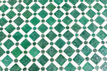 Background from traditional Moroccan pattern. Ceramic green rhombuses. City of Fez. Morocco....