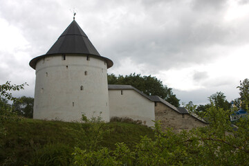 Fototapeta premium Russia Pskov region Pechersky monastery view on a cloudy summer day