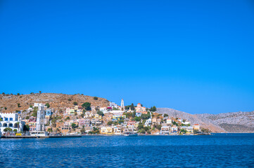 Fototapeta premium Views across the bay on the Greek Island of Symi