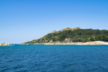 Fototapeta premium view of the natural park of the Cies Islands in the atlantic ocean from a boat. Vigo - Spain