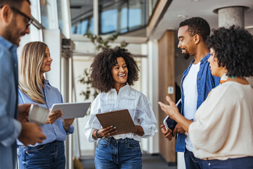 Diverse Team Engaged in Collaborative Office Discussion