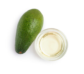 Fresh avocado and glass bowl with essential oil on white background
