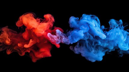 Fototapeta premium Dynamic swirls of red and blue smoke create a captivating visual contrast against a dark background.