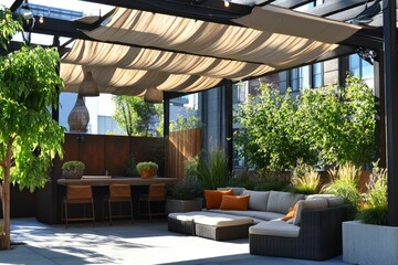 Sunlit patio with seating, plants, and shade structure.
