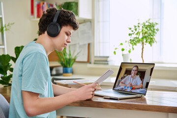 Young male on online therapy with psychologist, psychotherapist