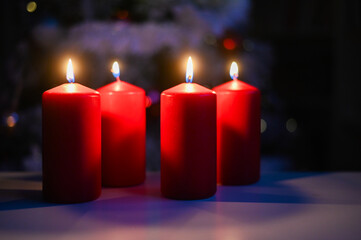 red Christmas candles burning for Advent