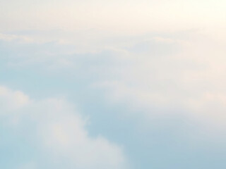 Fototapeta premium Ombre light blue abstract effect with wispy clouds, misty atmosphere, ethereal quality