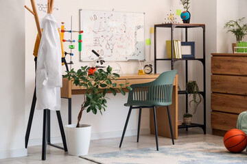 Stylish interior of modern teenager's room with microscope, chemical flasks and medical robe
