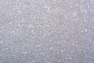 Fototapeta premium A shiny, glittery surface with a lot of small, shiny specks