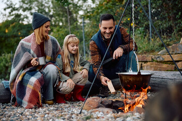 Fototapeta premium Happy family enjoying in camping weekend in nature.
