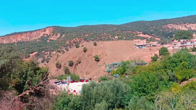 Construction Workers Building in the Atlas Mountains, Sources Oum Rabia, Morocco