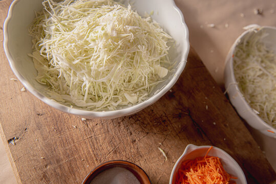 grated white cabbage and carrots and salt. Fermenting cabbage