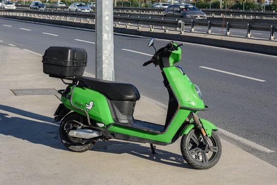 ISTANBUL, TURKEY - NOVEMBER 24, 2024: Rentable electric motorcycle that by the Turkish company Marti. Urban short-range transportation with alternative eco-friendly scooters.