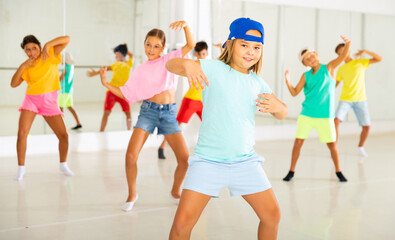 Fototapeta premium Dance studio - happy girls and boys in dance lesson