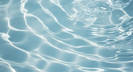 Obraz premium Rippling blue water surface with sunlight reflections