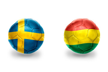 Obraz premium football balls with national flags of sweden and bolivia ,soccer teams. on the white background.