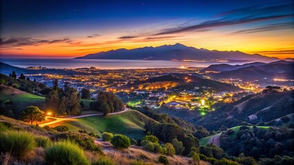 Captivating Low Light Photography of Santa Barbara Hills at Dusk, Showcasing the Serene Malibu Mountains and Vibrant Night Sky Over California's Coastal Landscape